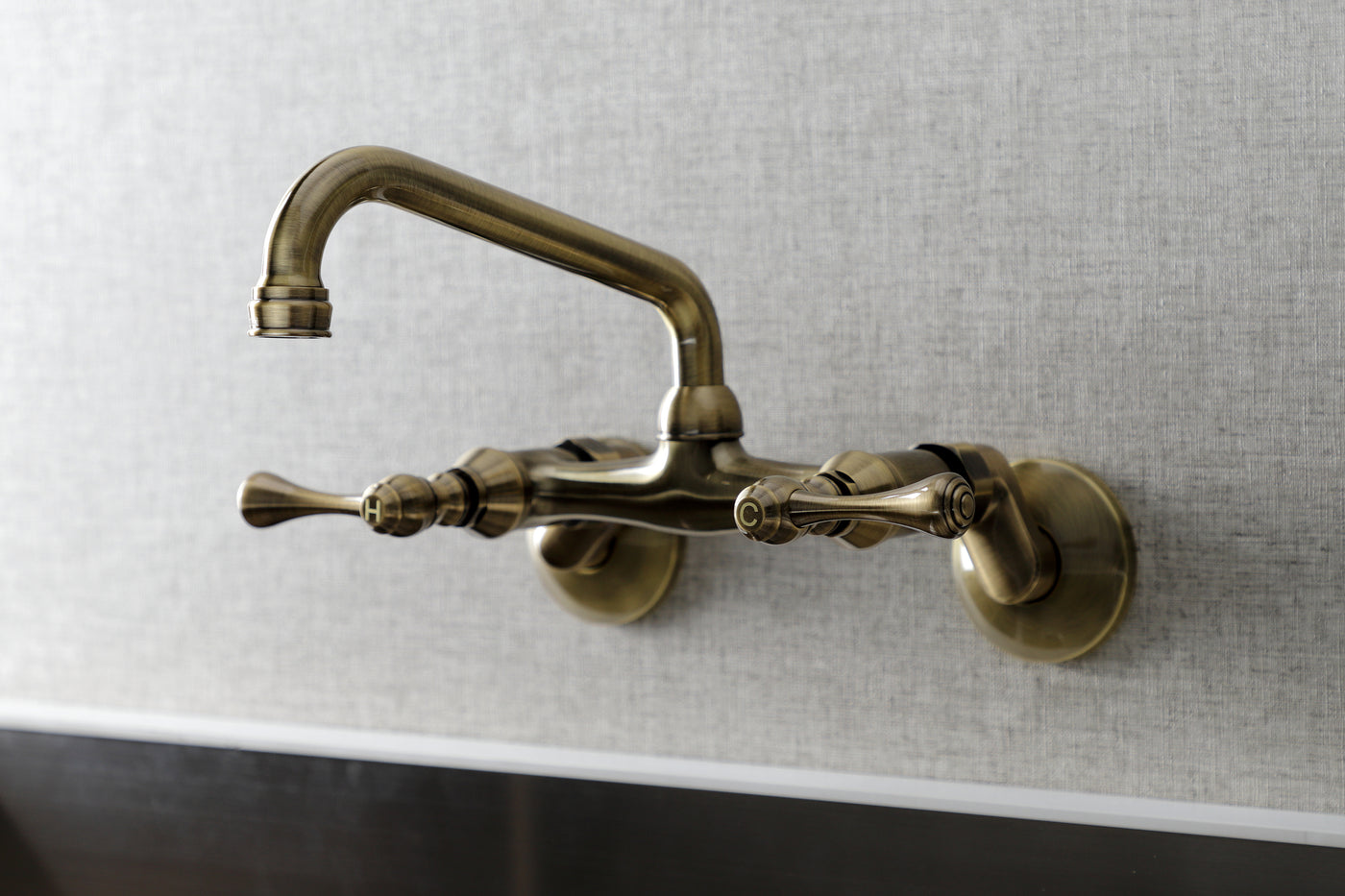 Elements of Design ES3133L Adjustable Center Wall Mount Kitchen Faucet, Antique Brass