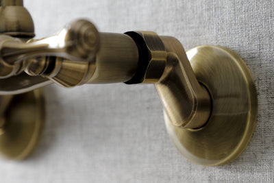 Elements of Design ES3133L Adjustable Center Wall Mount Kitchen Faucet, Antique Brass