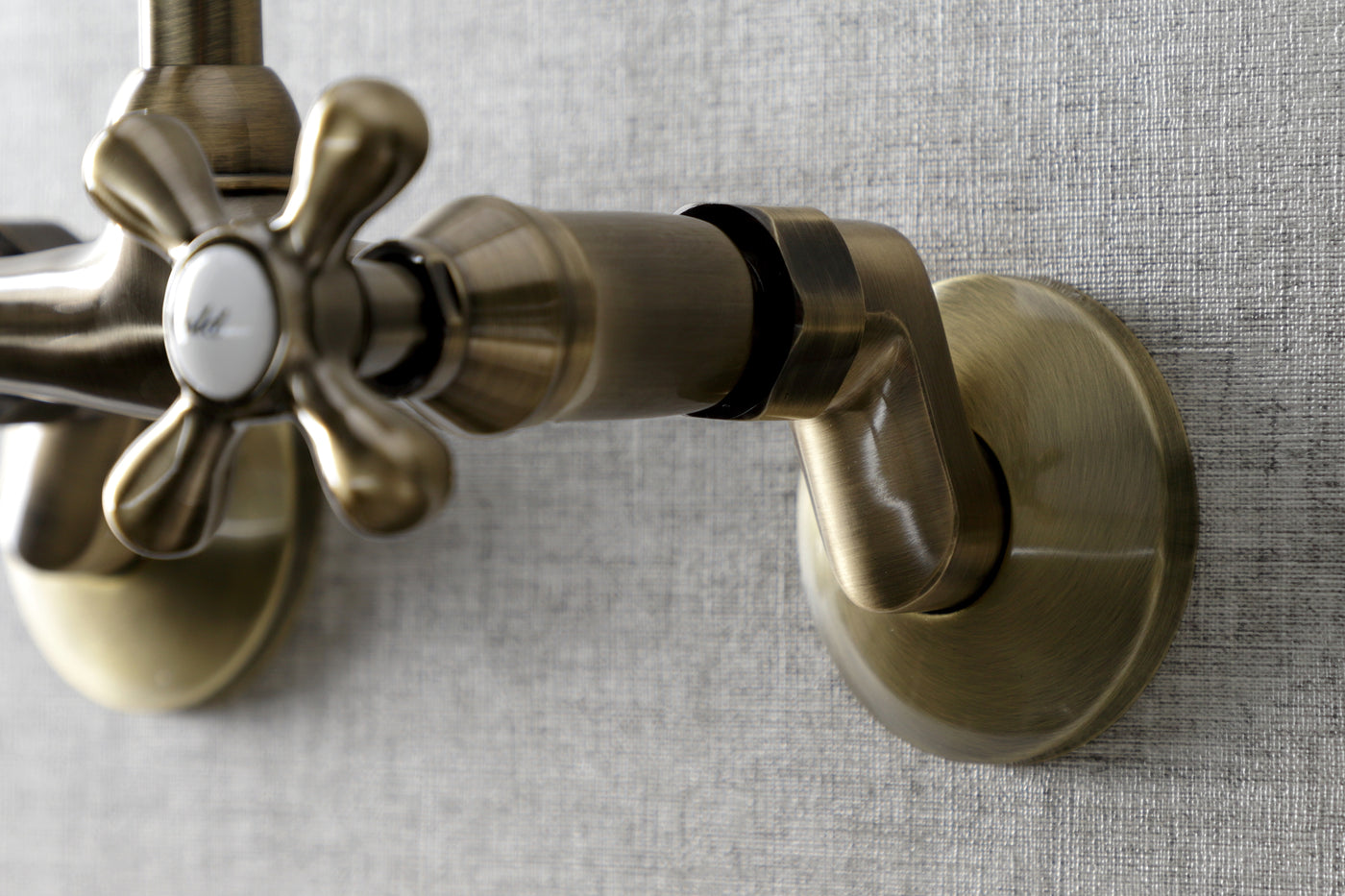 Elements of Design ES2133X Adjustable Center Wall Mount Kitchen Faucet, Antique Brass