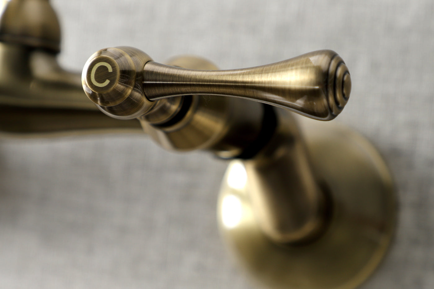 Elements of Design ES3133L Adjustable Center Wall Mount Kitchen Faucet, Antique Brass